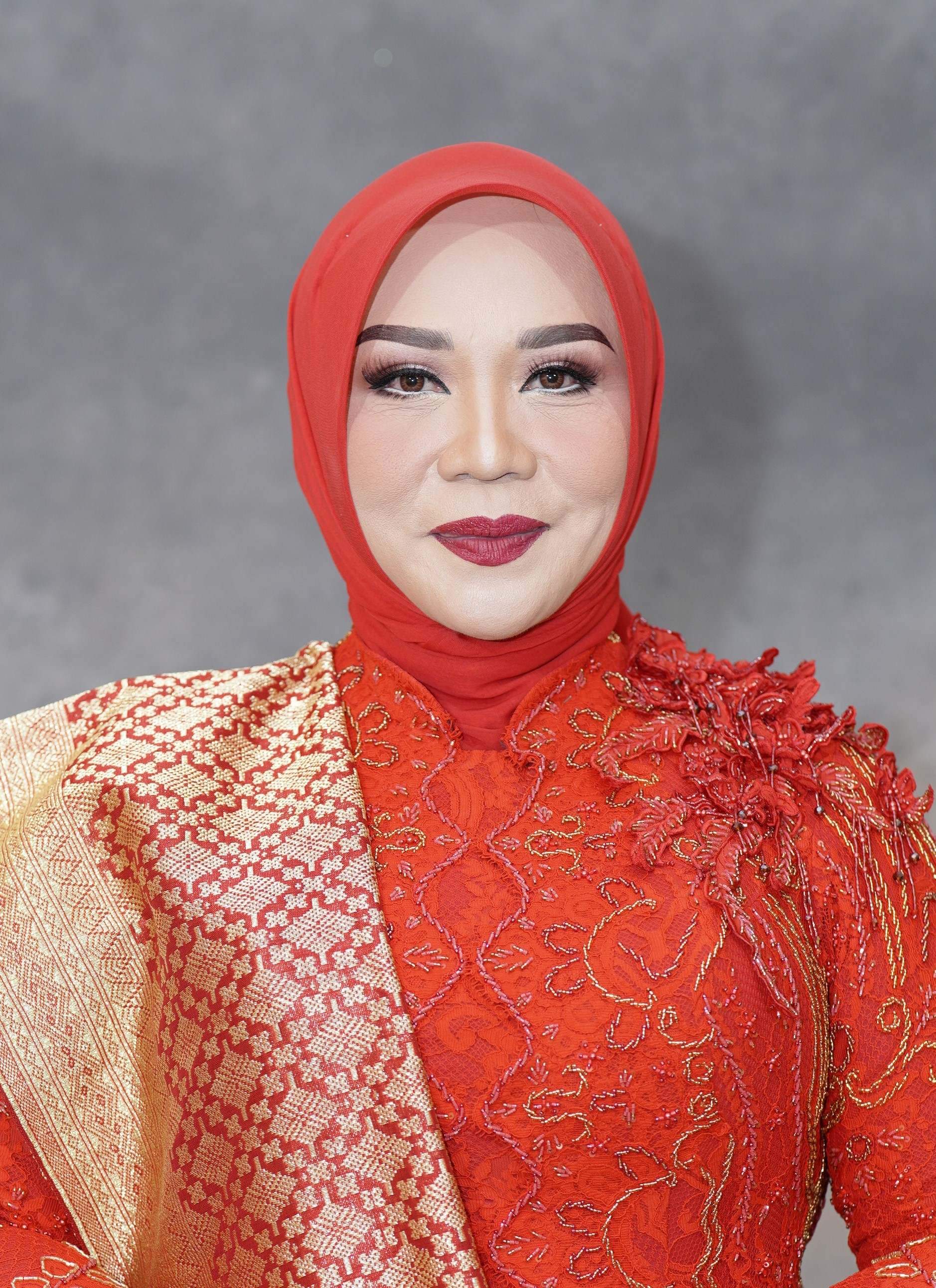 Hj. LUSIA INDAH ARTANI, SE, MM