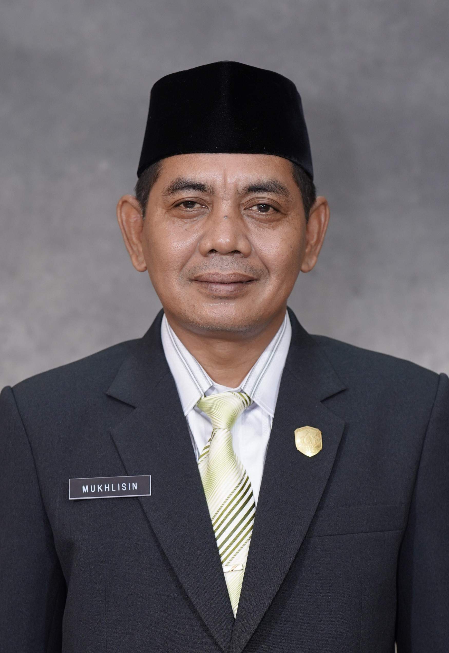 Ir.H. MUKHLISIN, MM, M.Si